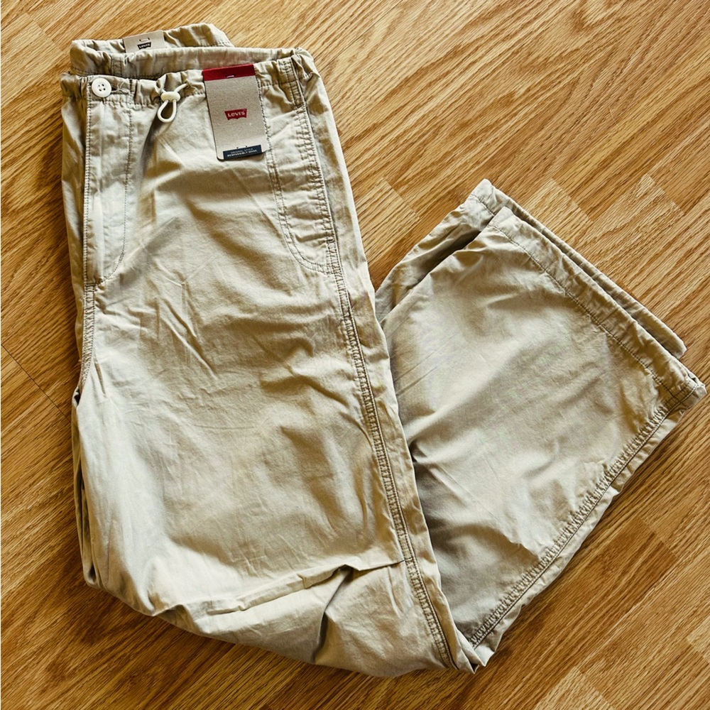 Women’s Levi  khaki parachute pants. Brand new with tag. Size small.